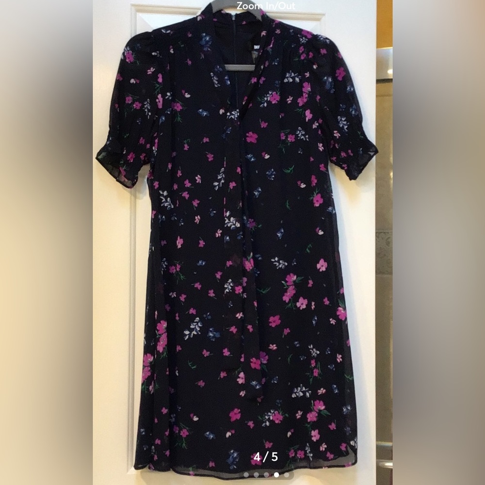 DKNY floral knee length navy dress, lined with sheer sleeves